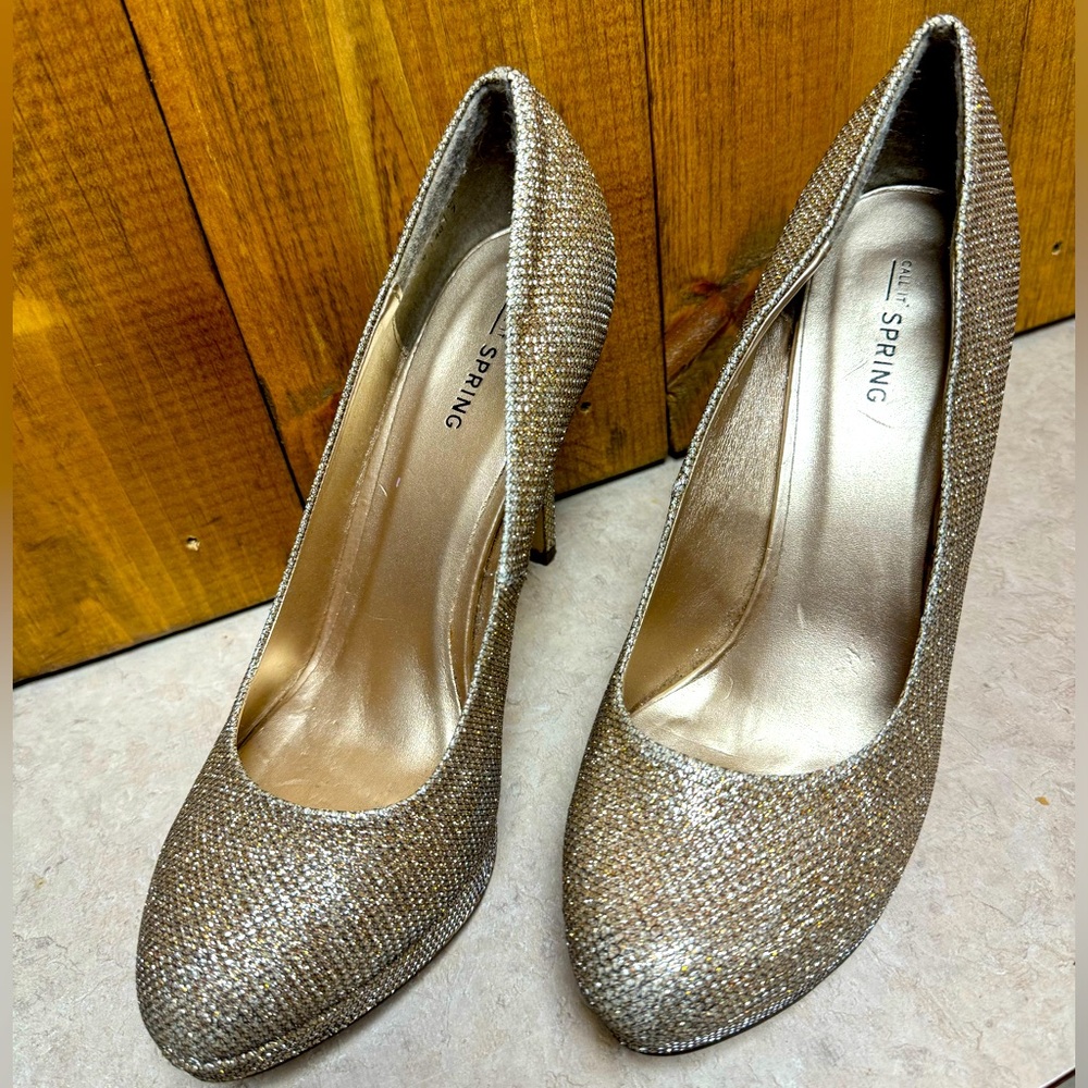 Gold sparkly heels.
